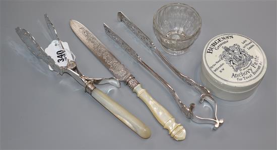 Three plated servers, a paste pot and a glass